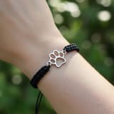 Stainless Steel Dog Paw Pendant With A Hand-woven Flat-knot Adjustable Wrist Cord